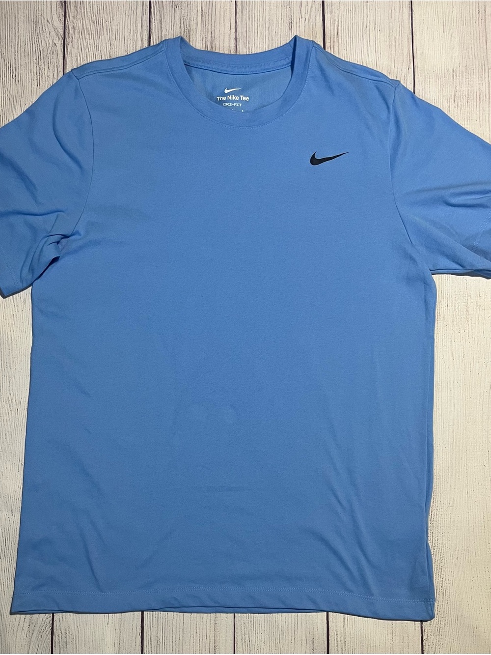 Nike Light Blue Short Sleeve Dri-FIT Tee with Black Swoosh size L